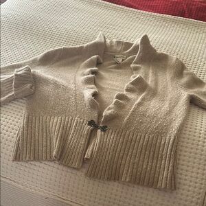 Elegant Cream Sweater with Ruffle Detail